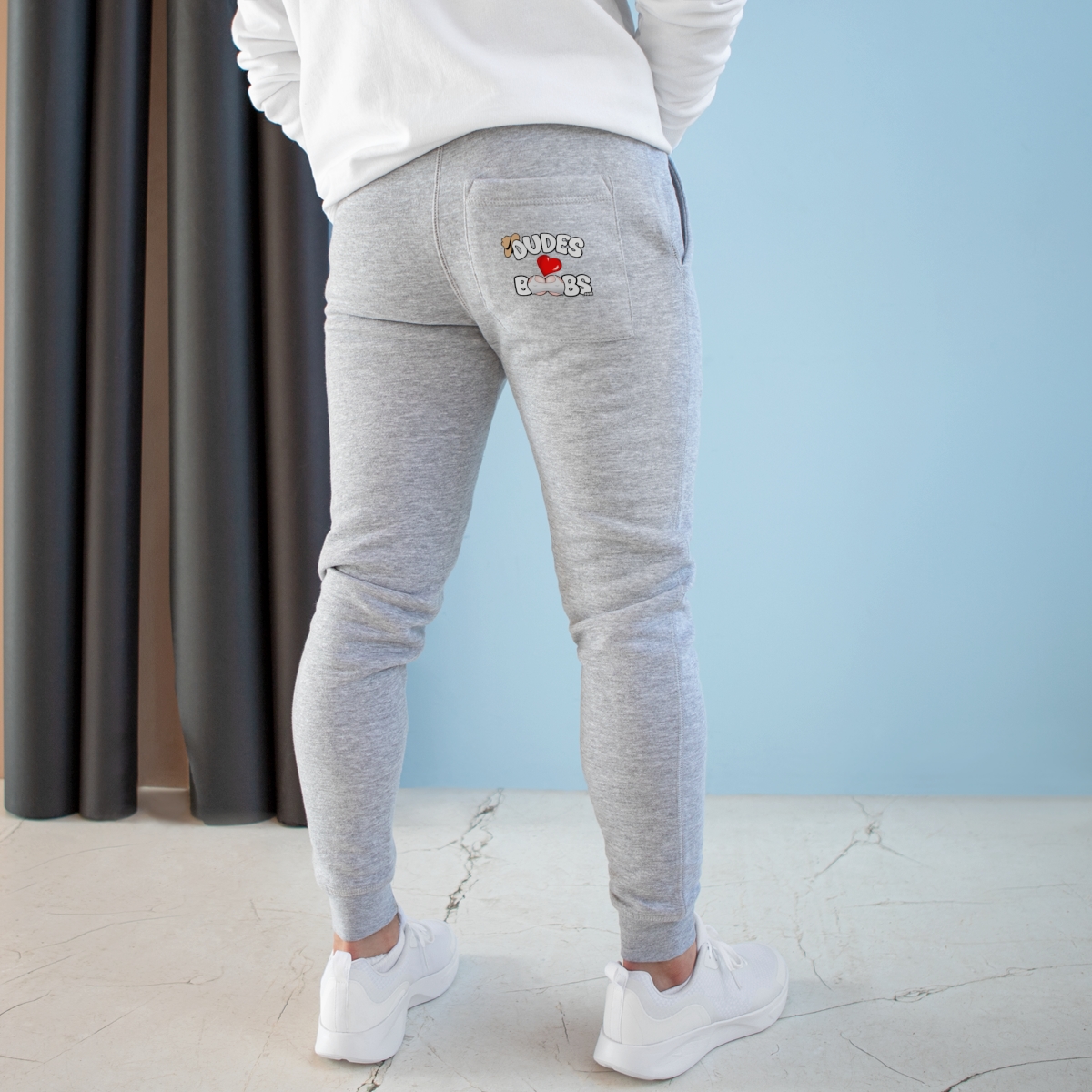 Unisex Fleece Joggers DUDES LOVE BOOBS brand-logo